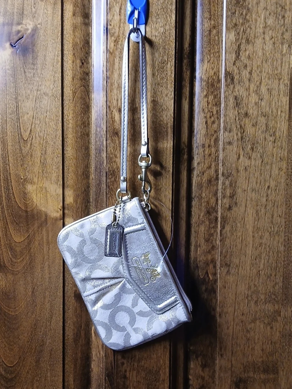 Coach Gold Signature Wristlet with Metallic Logo